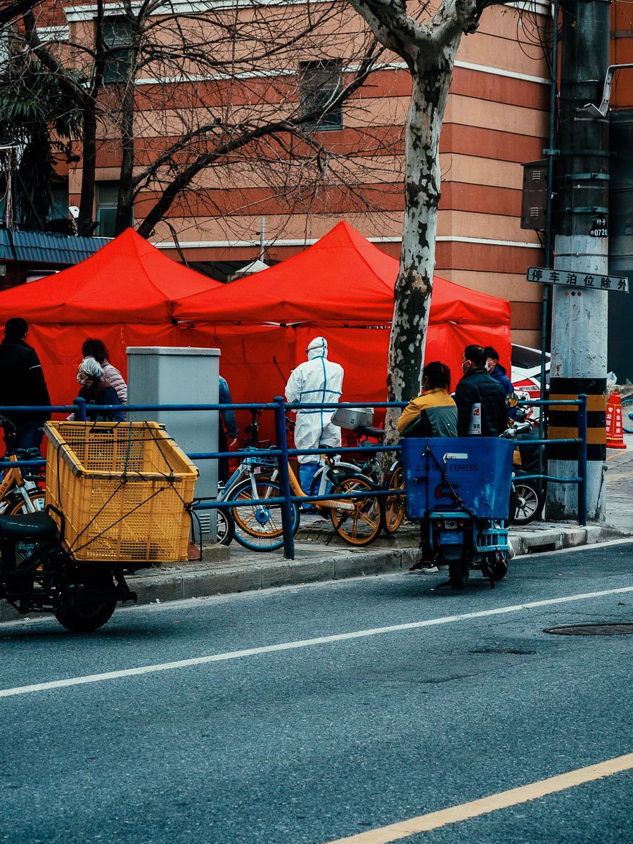 a temporary test center in front of a compound gate