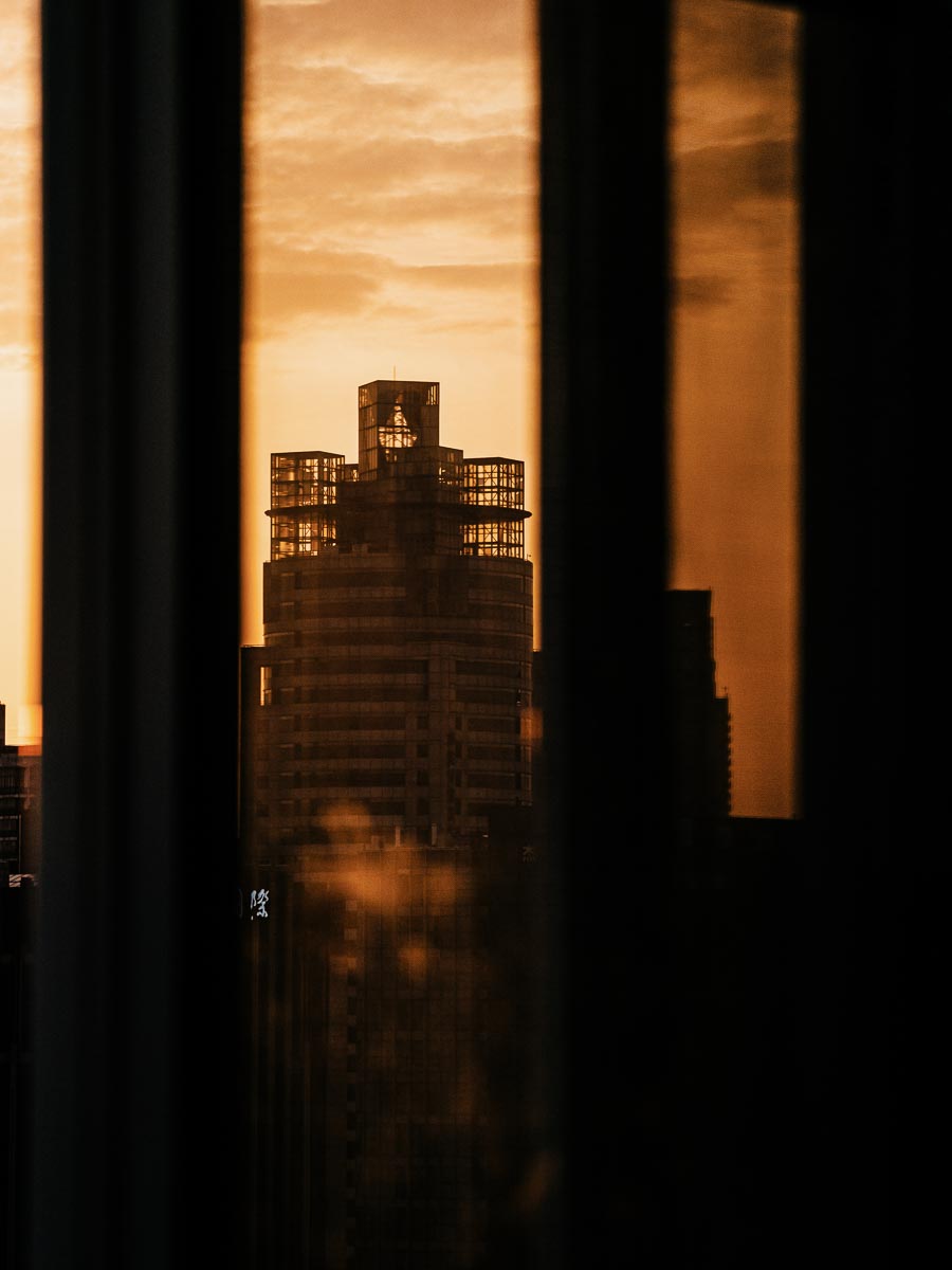 I'm watching the quiet and peaceful sunset from my window.