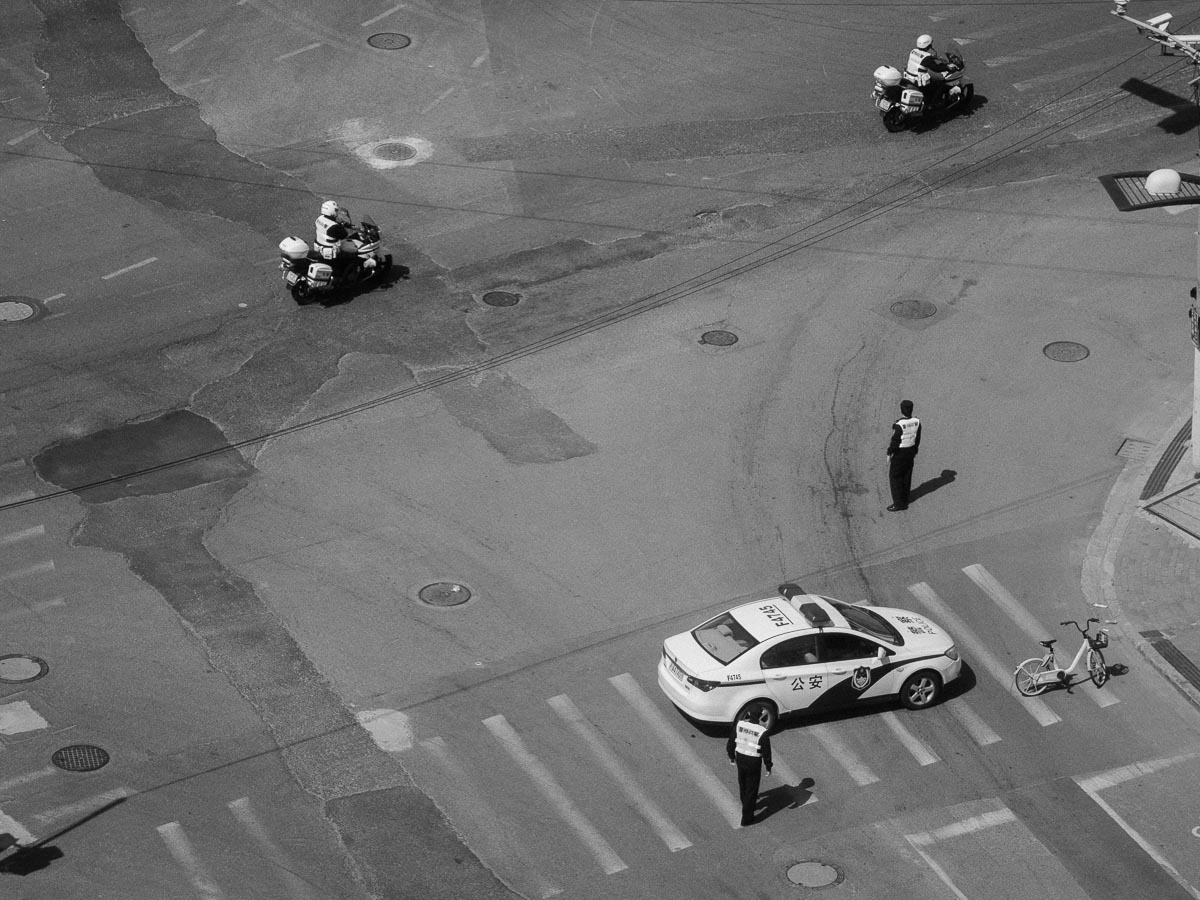 The police check the streets to not let anyone out